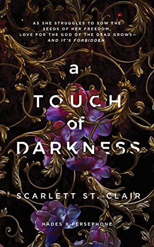 Book cover with dark floral design and gold, ornate lettering.