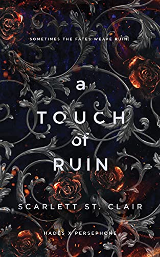 Book cover: ornate silver design with red roses on a dark, starry background.