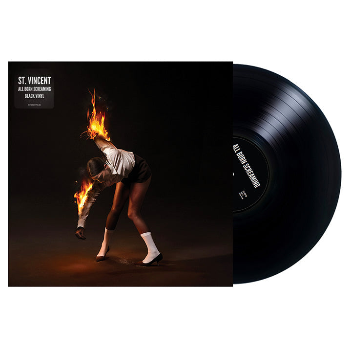 St. Vincent album cover with a person engulfed in flames, black vinyl record.