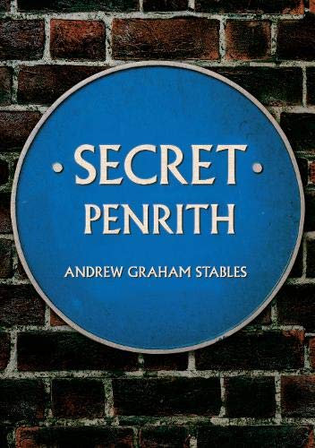 Blue circular plaque reading "Secret Penrith" against a brick wall.