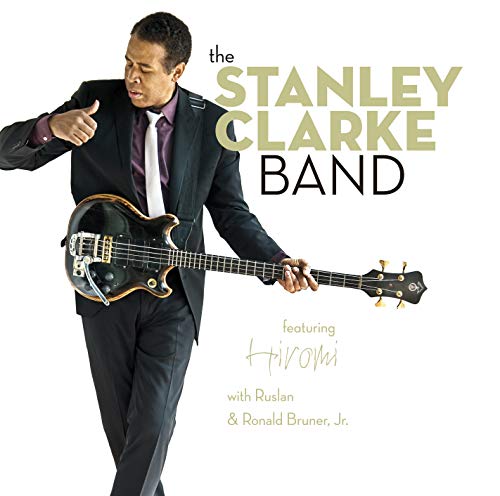 Stanley Clarke playing bass guitar on album cover, with text details.