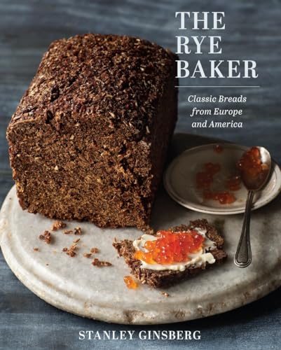 Cookbook cover featuring a dark rye bread loaf with jam and cream cheese.