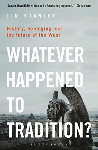 Book cover with large white text and a blurred image of a gargoyle.