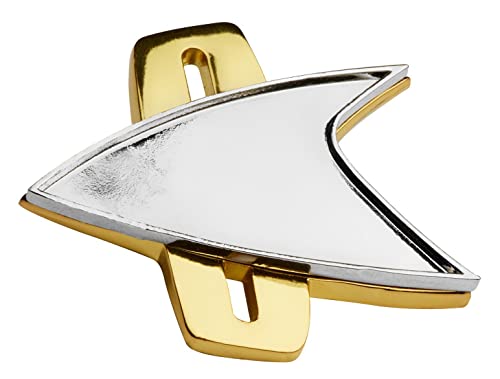 Star Trek Voyager delta-shaped communicator badge with silver center and gold backing.