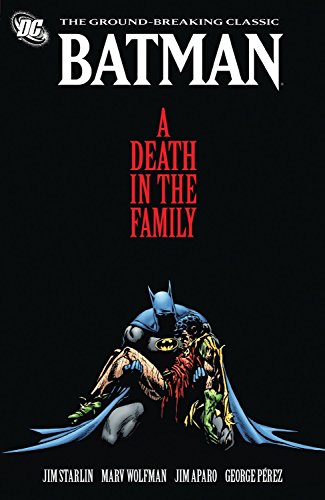 Batman holds an injured Robin on a black background with red title text.