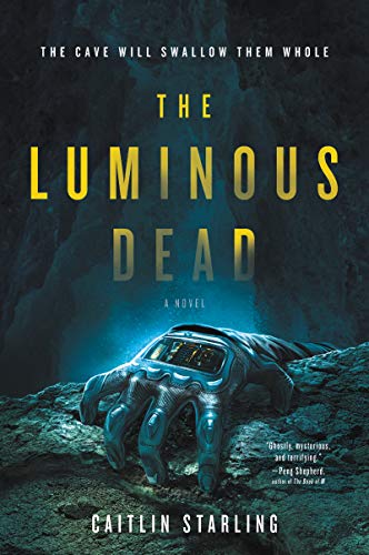 Book cover featuring a glowing futuristic glove resting on a dark, rocky cave floor.