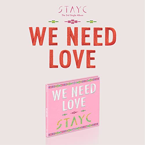 Stayc “We Need Love” CD case on a light pink background.