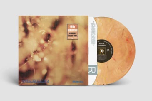 Steamhammer “Reflection” marble vinyl record with orange and brown swirls.