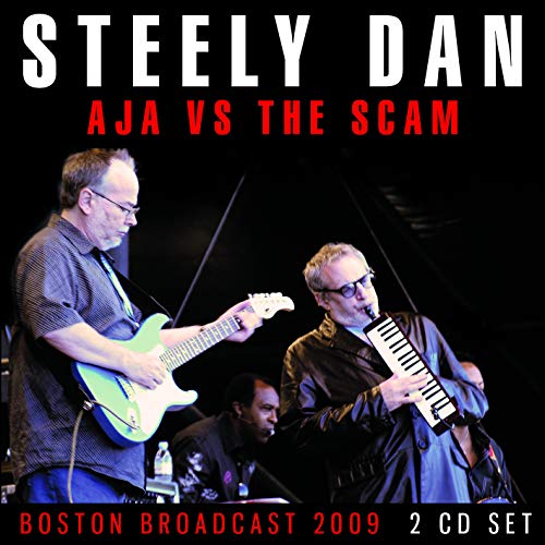 Steely Dan album cover featuring musicians performing live, black background.