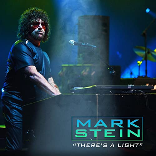 Mark Stein at a keyboard on stage, album cover for "There's A Light".