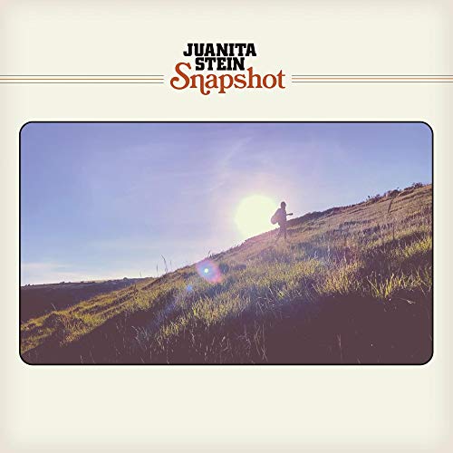 CD cover for "Snapshot" by Steinjuanita, showing a person walking uphill.