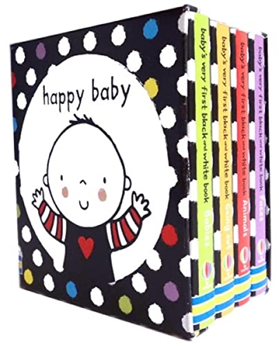 A box set of four small books with black and white polka dot covers.