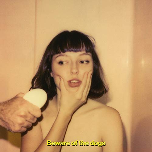 CD cover featuring Stella Donnelly with a hand holding an egg.