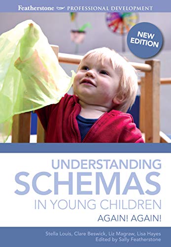 A young child in a red jacket holds a green translucent scarf.