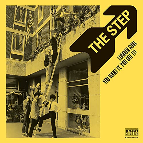 Yellow vinyl record cover featuring a band climbing a building.
