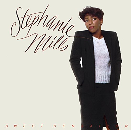 Stephanie Mills album cover, "Sweet Sensation", featuring a portrait of the artist.