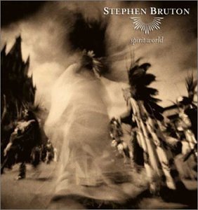 "Album cover art featuring a sepia-toned image of a person surrounded by feathered figures."