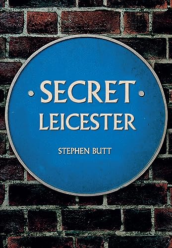 Blue circular plaque reading "Secret Leicester" against a brick wall.