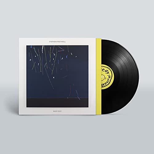 Vinyl record of Stephen Fretwell’s “Busy Guy” with abstract cover art.