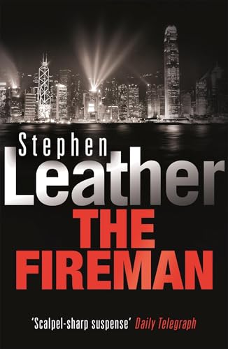 Book cover: “The Fireman” by Stephen Leather, city skyline with red light.