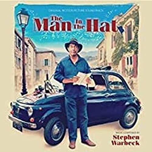 CD cover: man in hat with vintage car in a townscape.