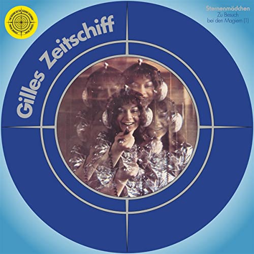 Vinyl record cover: blue target design with a woman in silver clothing.