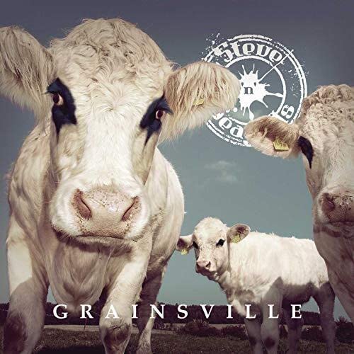 CD cover featuring a close-up of a white cow and calf in a field.