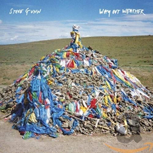 CD cover: colorful prayer flags piled on a grassy hill.