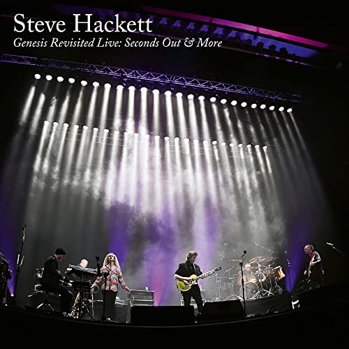 Steve Hackett live band performing on a stage with bright spotlights.
