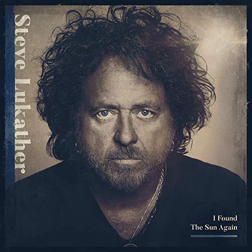 Steve Lukather album cover: close-up portrait of a man with curly hair.