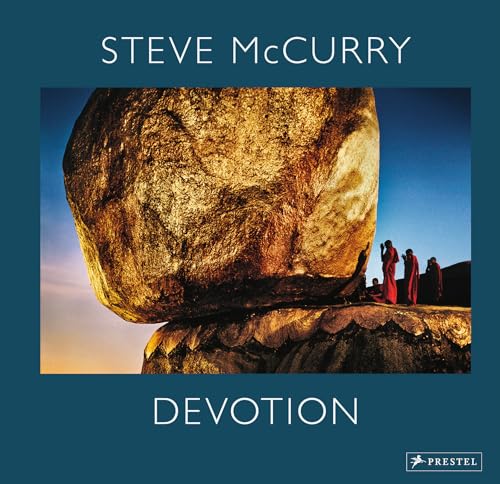 Book cover: large rock, monks in red robes, blue sky.