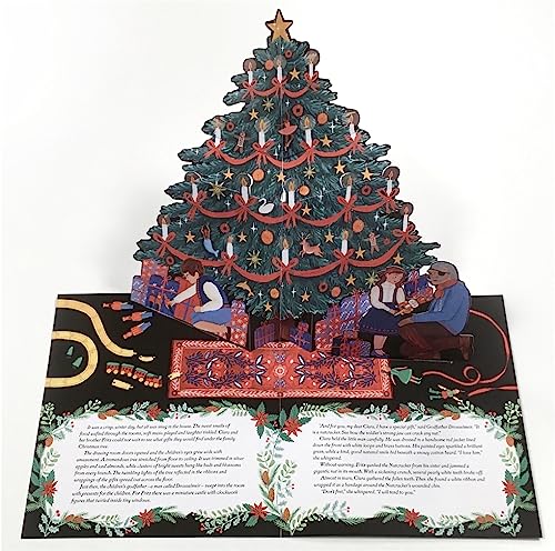 Pop-up book spread depicting a decorated Christmas tree and family scene.