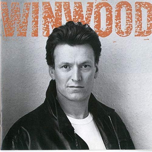 Steve Winwood album cover, portrait of a man in a leather jacket.
