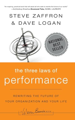 Book cover: "The Three Laws of Performance" with a gyroscope image.
