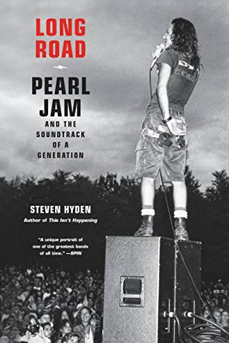 Book cover: "Long Road" about Pearl Jam, with a concert photo.