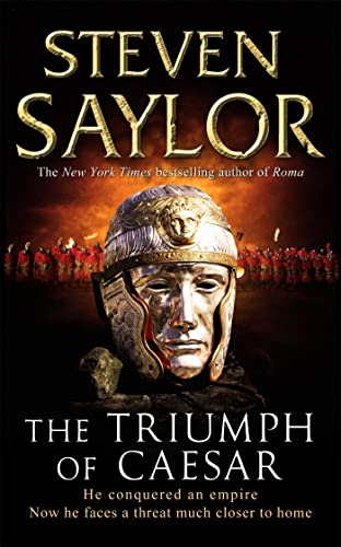 Book cover: Roman soldier’s helmeted face, fiery background, title “The Triumph of Caesar.”