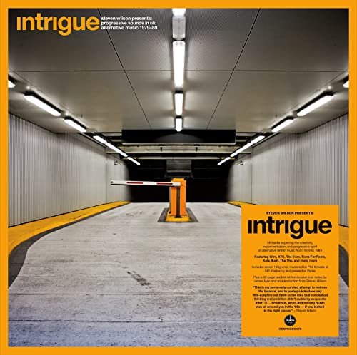 Vinyl record cover: a yellow parking garage tunnel with text overlay.