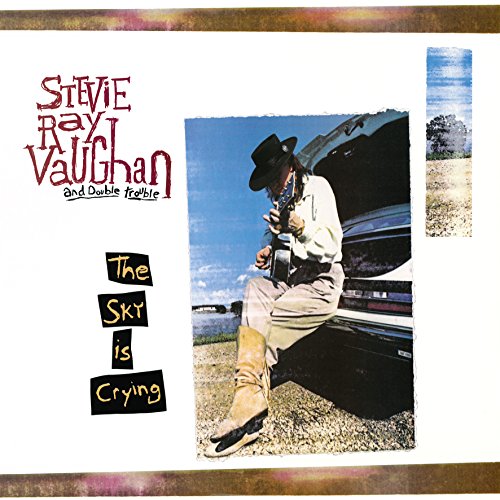 Album cover for Stevie Ray Vaughan’s “Sky Is Crying” with musician and car.