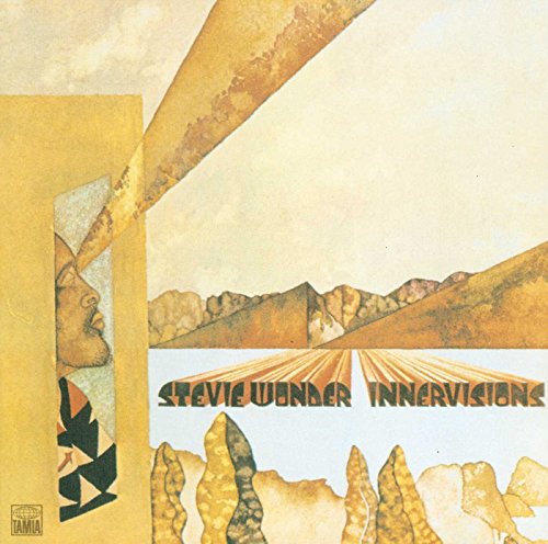 Album cover art for Stevie Wonder Innervisions featuring a surreal landscape and profile portrait.