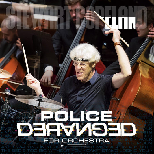 "CD cover featuring Stewart Copeland playing drums with an orchestra behind him."