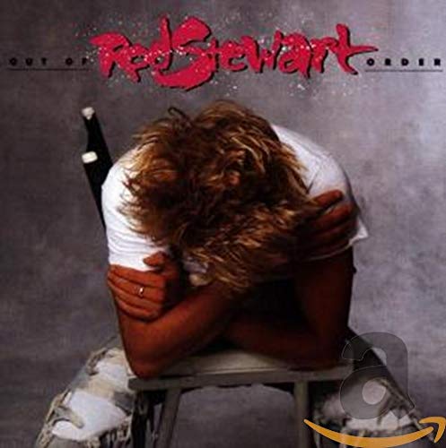 Rod Stewart album cover: man with head in arms, distressed.