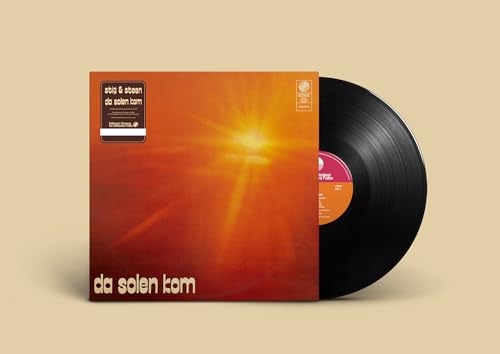 Vinyl record with orange cover depicting a sunburst design.