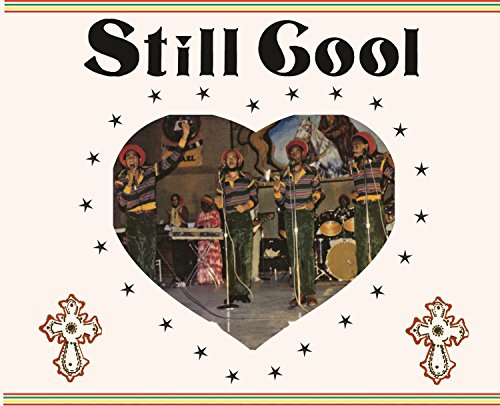 Vinyl album cover: band photo within a heart, stars, and crosses.