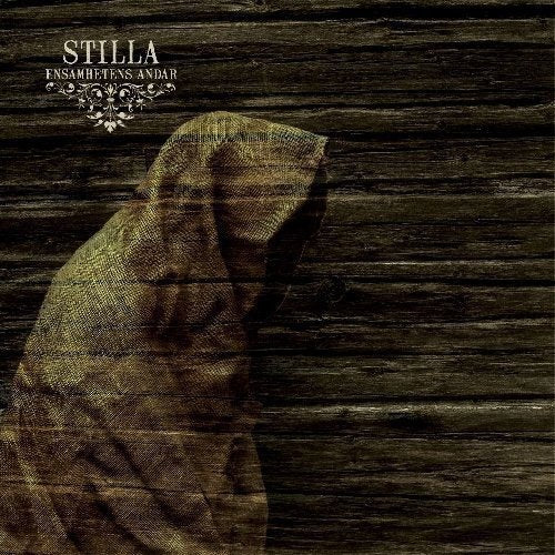 Hooded figure with face obscured, against a dark woodgrain background.