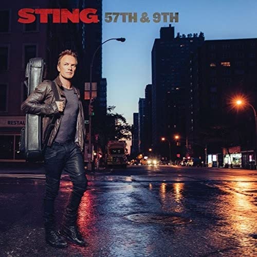 "Person with guitar case on city street at dusk, album titled 'Sting - 57TH & 9TH.'"