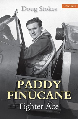 Black and white portrait of pilot Paddy Finucane in a cockpit.
