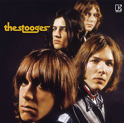 AlbumLPs cover featuring four members of The Stooges against a dark background.