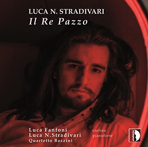 CD cover featuring a portrait of a man with long hair, red lighting.