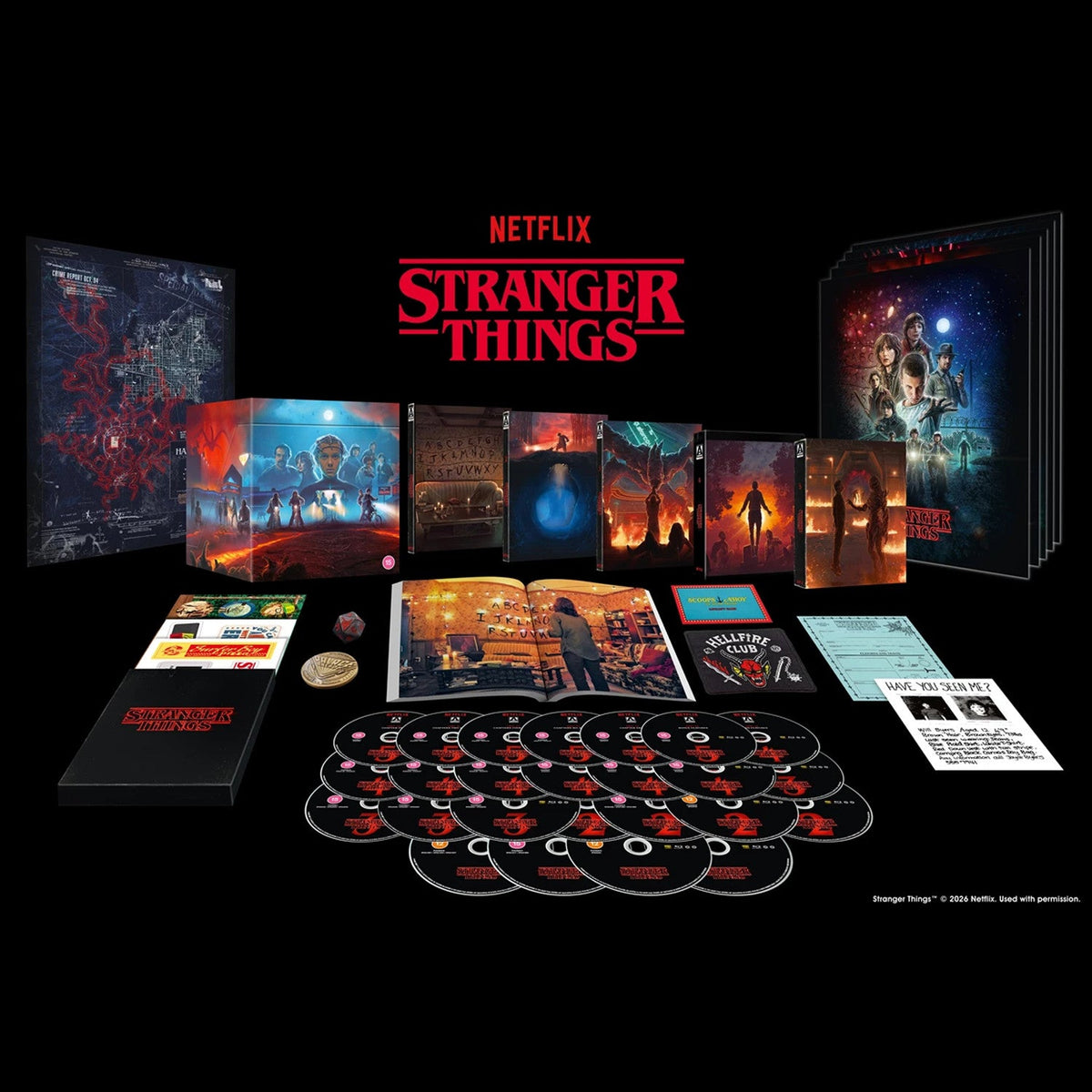 Stranger Things" seasons 1-5 Blu-ray box set with discs and collectibles.