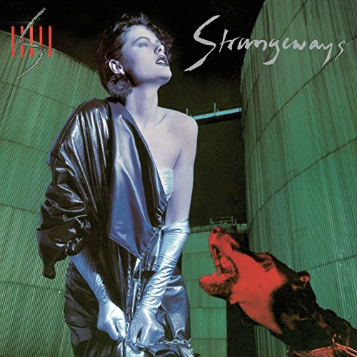 Album cover: woman in silver, dog, green background, band name "Strangeways".